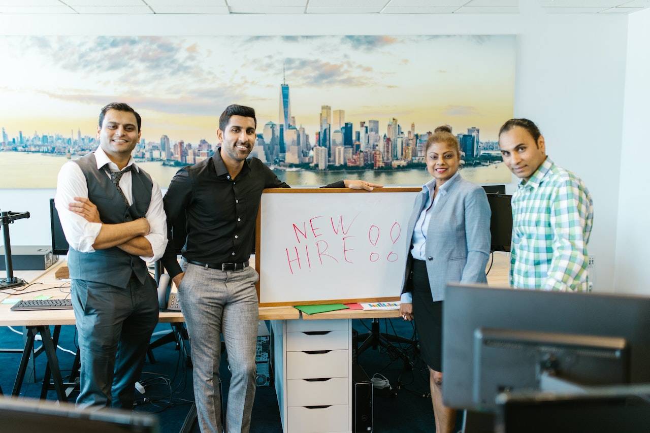 hr manager standing with a new hire